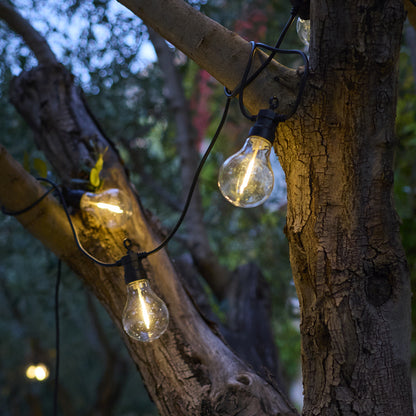 Guirlande lumineuses extérieur raccordable 20 globes transparents LED blanc chaud dimmable PARTY CLEAR HYBRID 8m solaire et sur secteur 13m